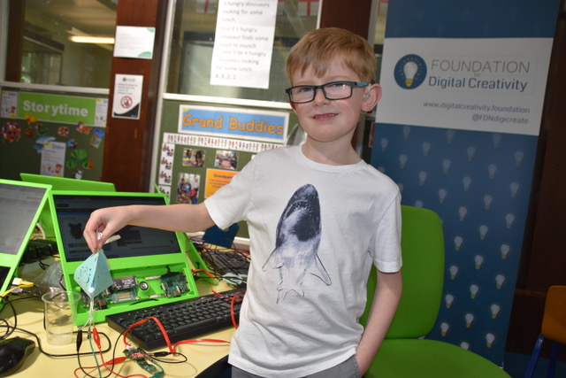 boy holding sensor project